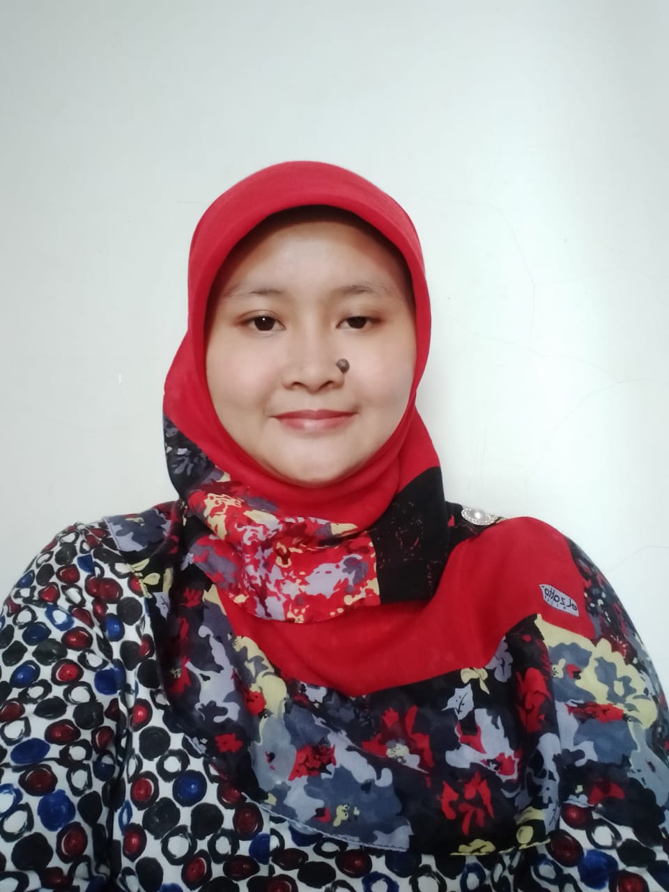 Dr. Hernik Farisia, M. Pd.I